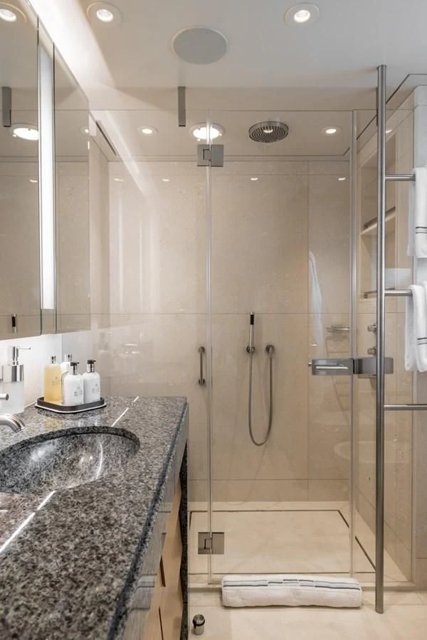 a bathroom with a shower unit and sink aboard VENTUM MARIS Yacht for Charter