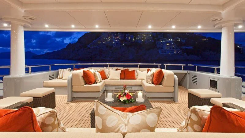 a living room with a large blue ocean aboard VENTUM MARIS Yacht for Charter