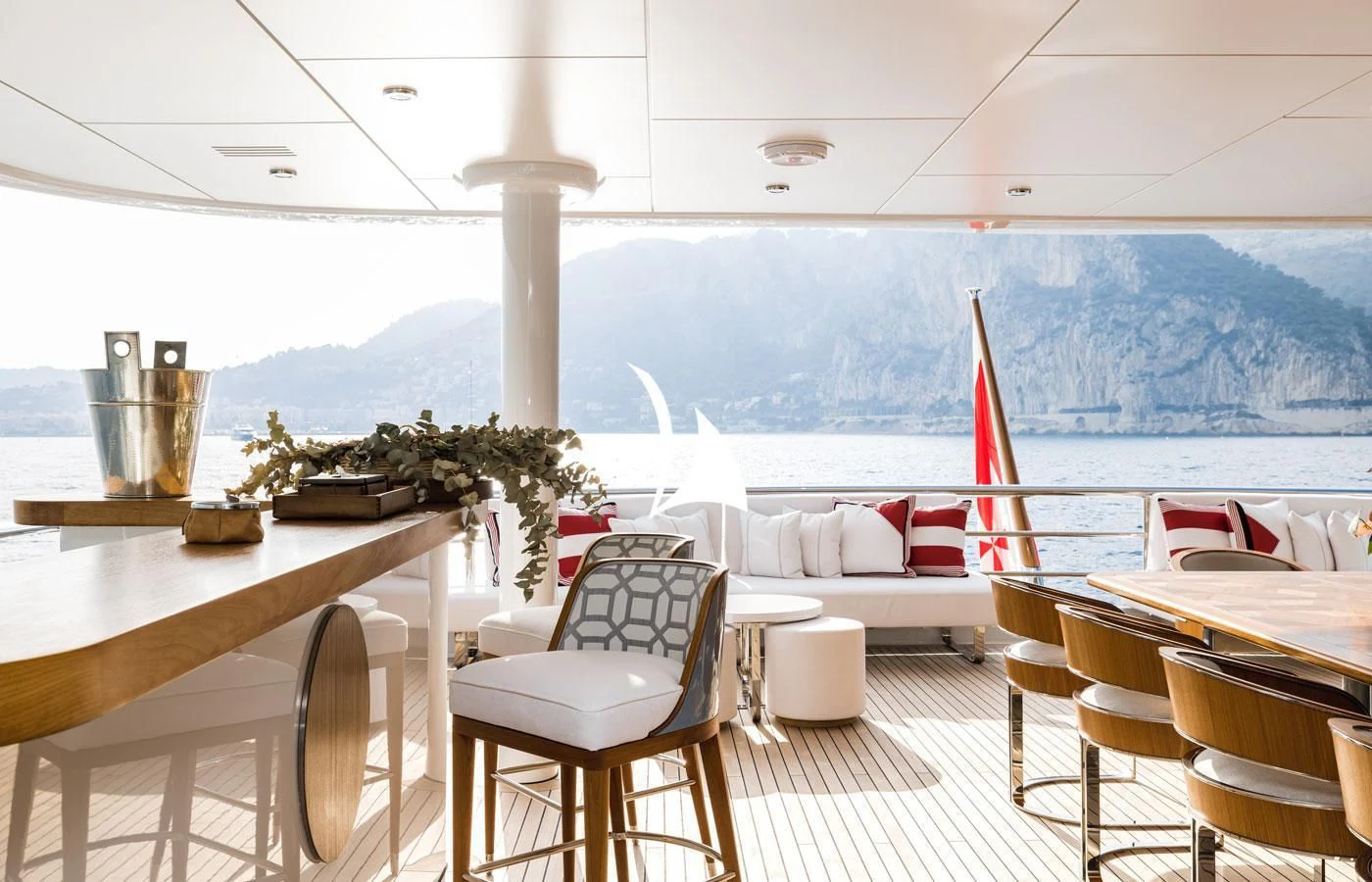a table and chairs on a deck aboard VENTUM MARIS Yacht for Charter