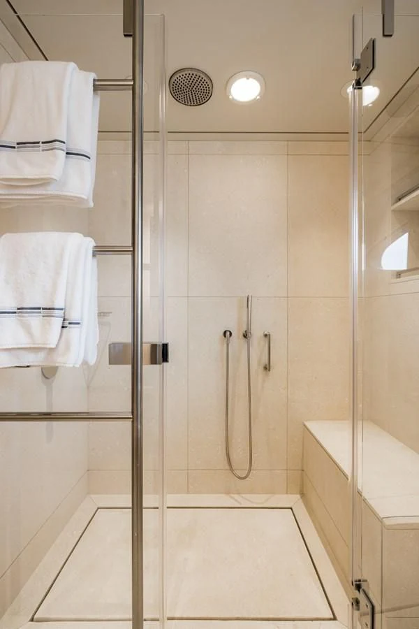 a bathroom with a shower unit aboard VENTUM MARIS Yacht for Charter