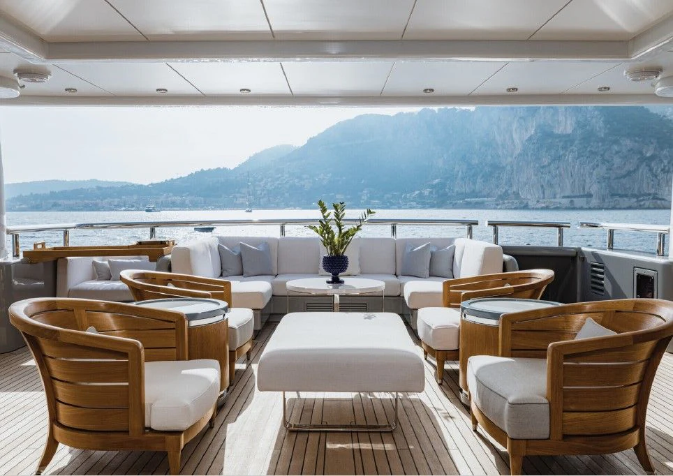 a room with a table and chairs aboard VENTUM MARIS Yacht for Charter