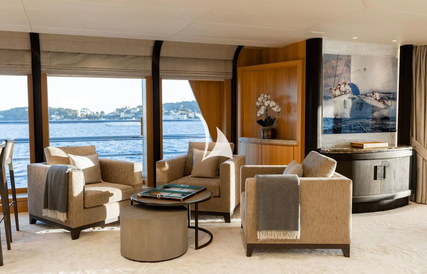 a living room with a large window aboard VENTUM MARIS Yacht for Charter