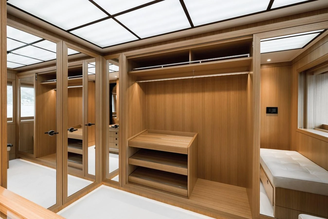 a room with a bed and a desk aboard VENTUM MARIS Yacht for Charter