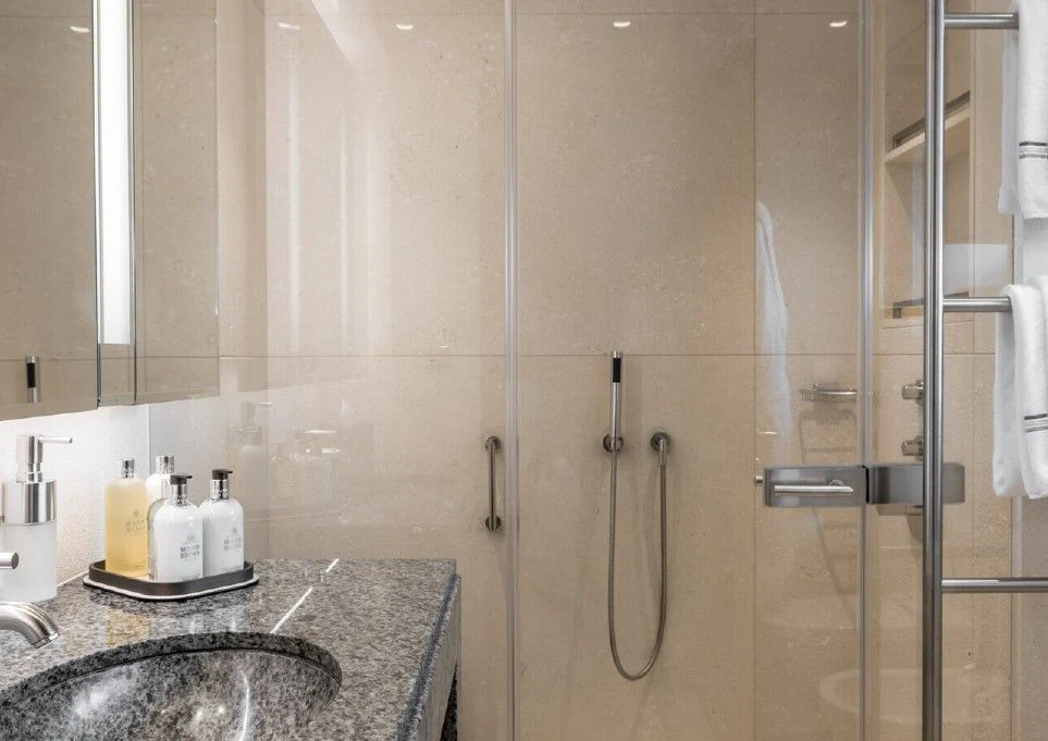 a bathroom with a shower unit and sink aboard VENTUM MARIS Yacht for Charter