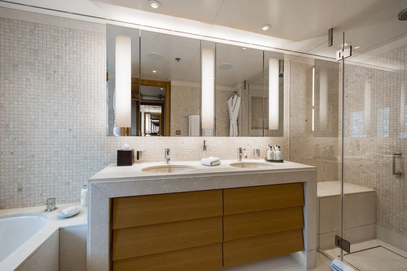 a bathroom with a large mirror aboard VENTUM MARIS Yacht for Charter