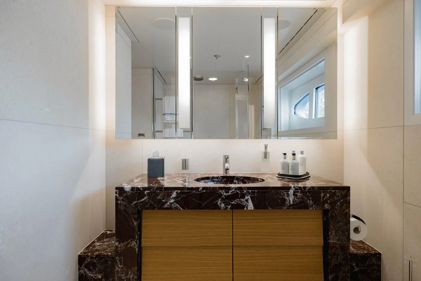 a bathroom with a large mirror aboard VENTUM MARIS Yacht for Charter