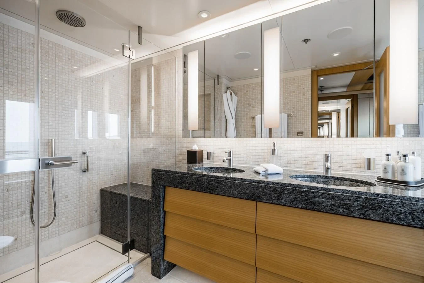 a bathroom with a glass shower aboard VENTUM MARIS Yacht for Charter