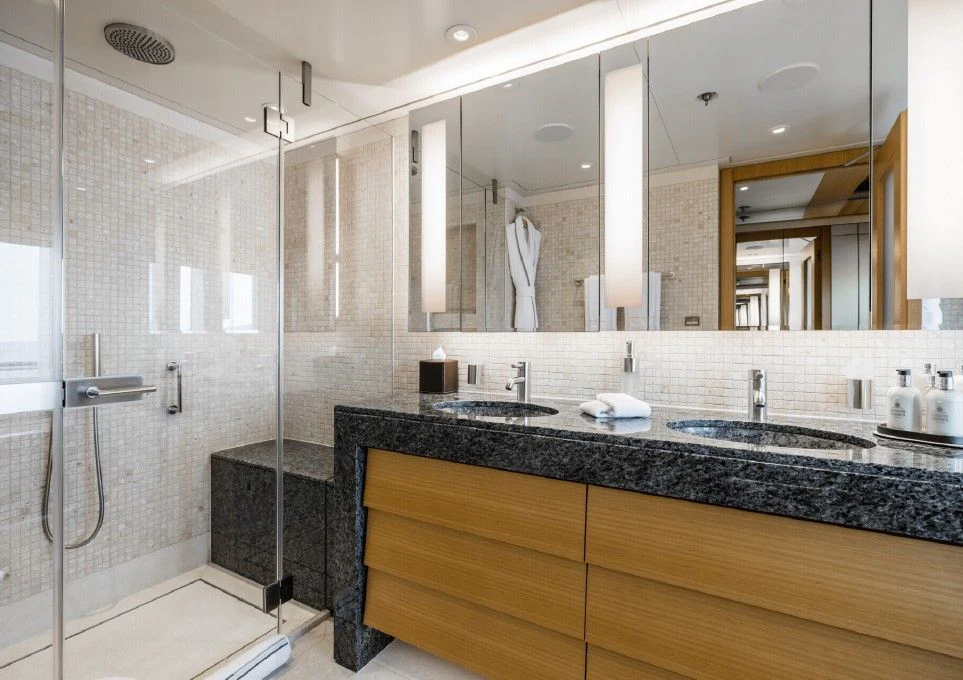 a bathroom with a glass shower aboard VENTUM MARIS Yacht for Charter