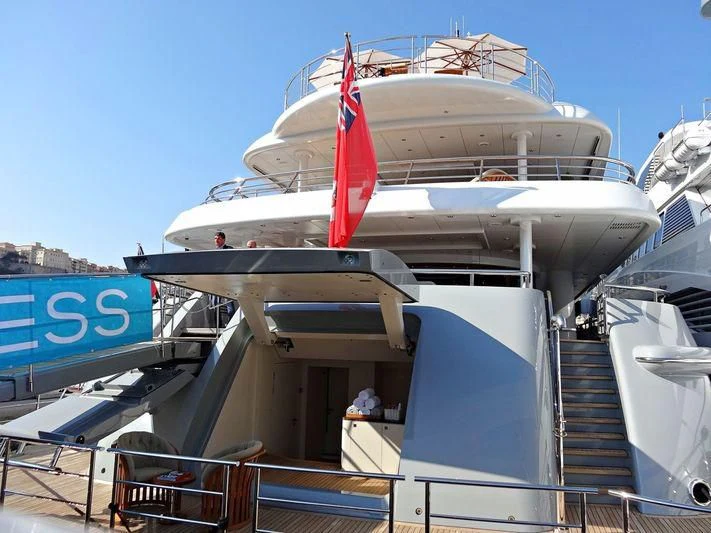 a large white boat with a red stripe on the front aboard VENTUM MARIS Yacht for Charter