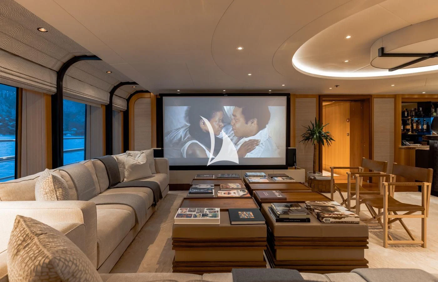 a living room with a large television aboard VENTUM MARIS Yacht for Charter