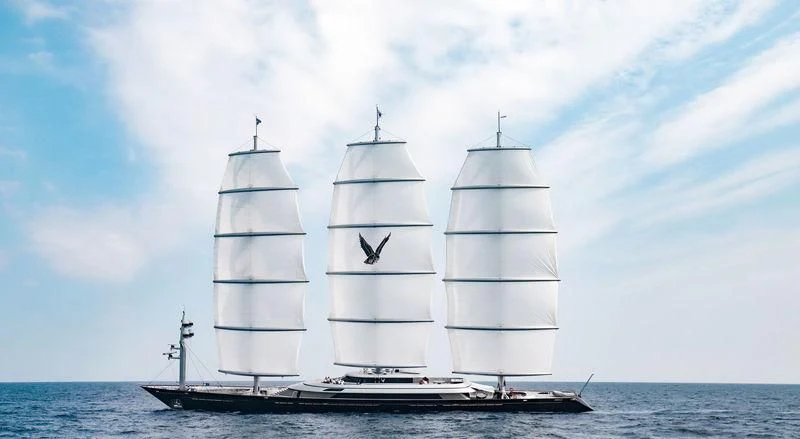 a couple of white boats on the water aboard MALTESE FALCON Yacht for Sale