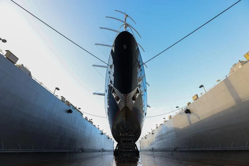 a large ship in a harbor aboard MALTESE FALCON Yacht for Sale