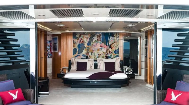 a bed in a room aboard MALTESE FALCON Yacht for Sale