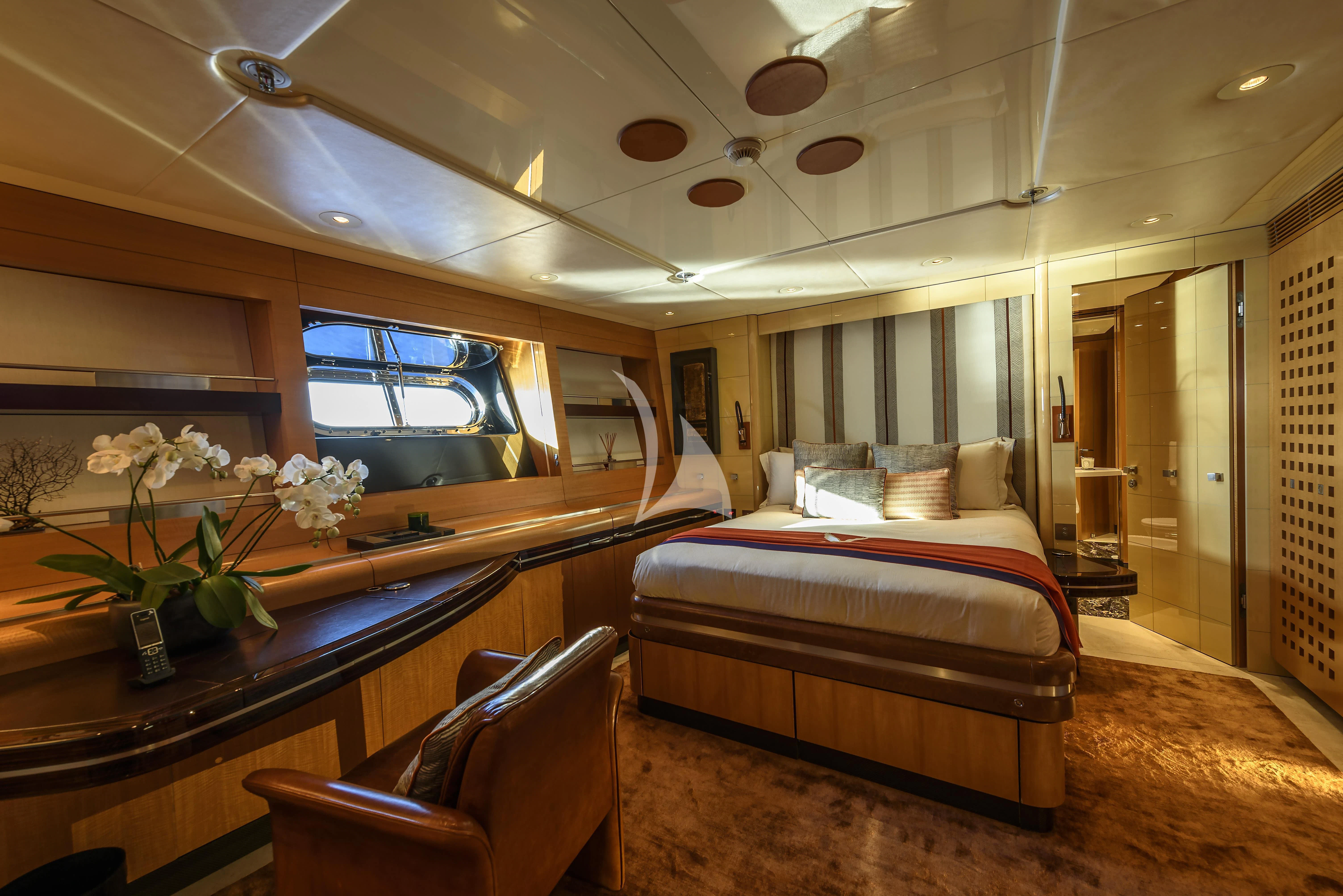 a bed in a room aboard MALTESE FALCON Yacht for Sale