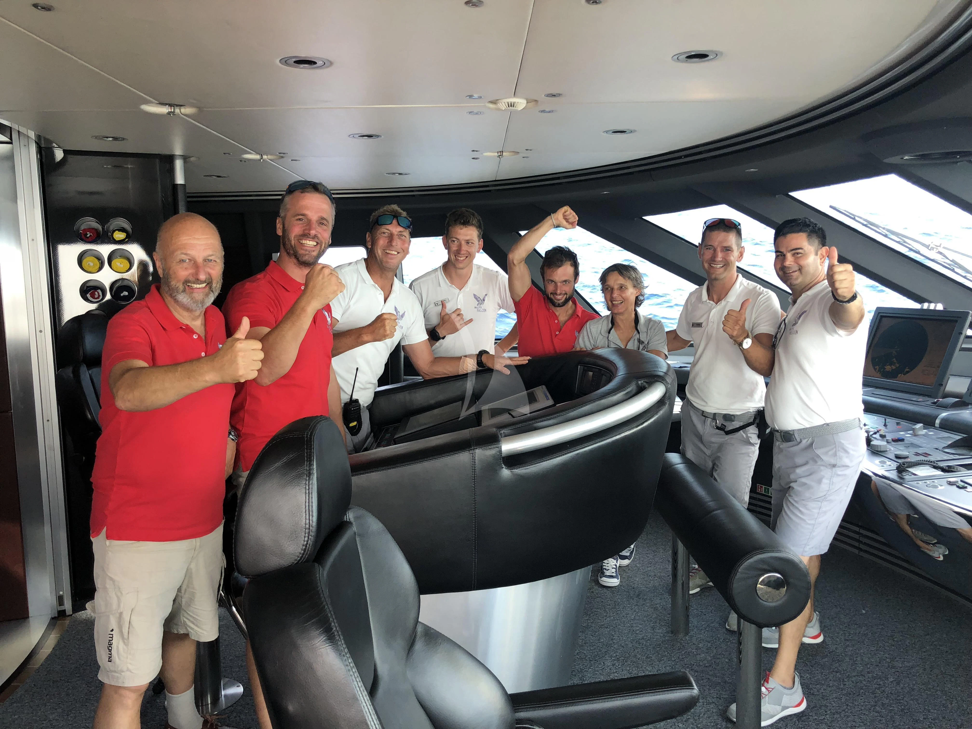 a group of people in a car aboard MALTESE FALCON Yacht for Sale