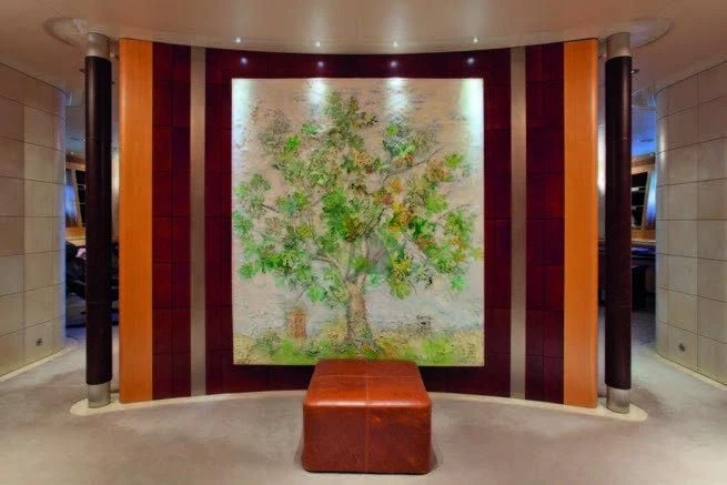 a room with a large painting aboard MALTESE FALCON Yacht for Sale