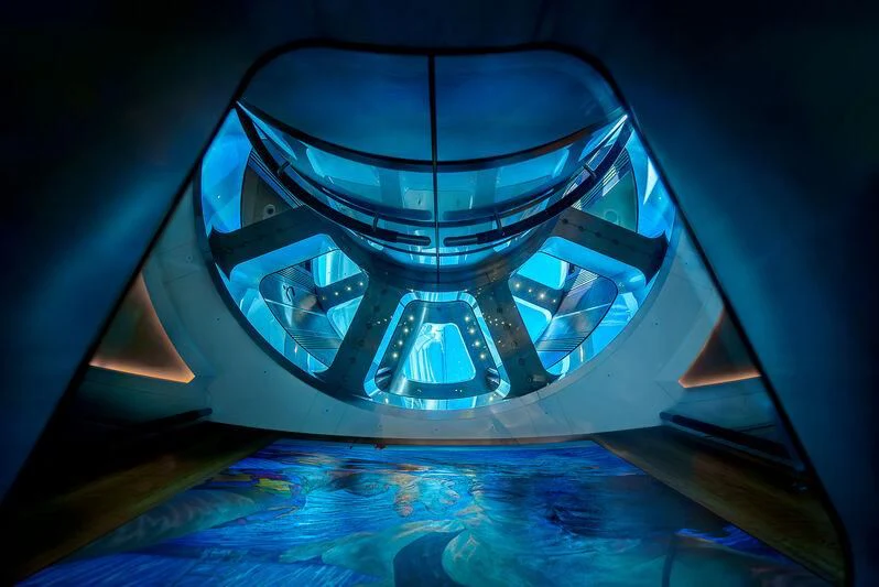 a blue and black spiral staircase aboard MALTESE FALCON Yacht for Sale