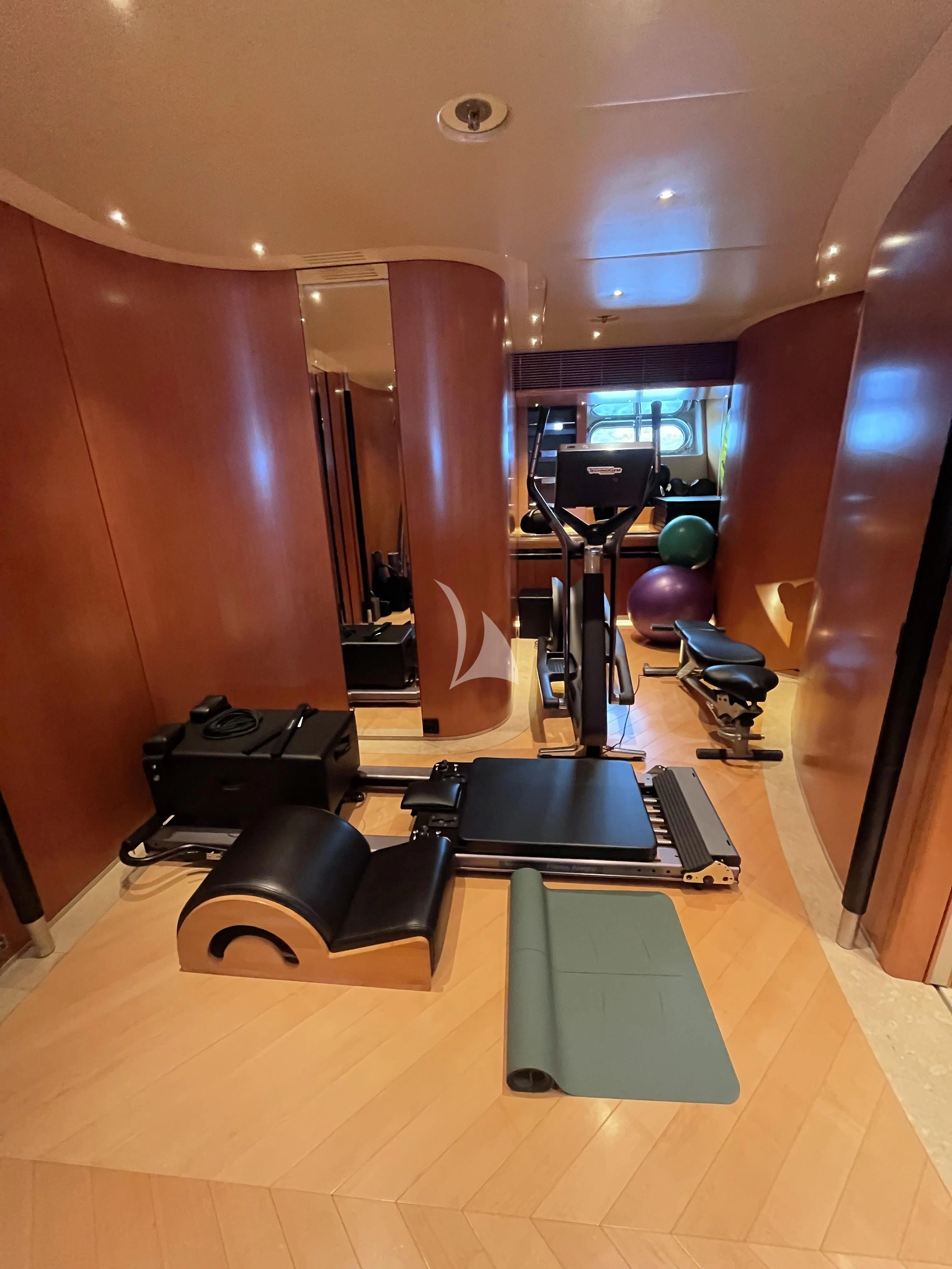 a room with a table and chairs aboard MALTESE FALCON Yacht for Sale