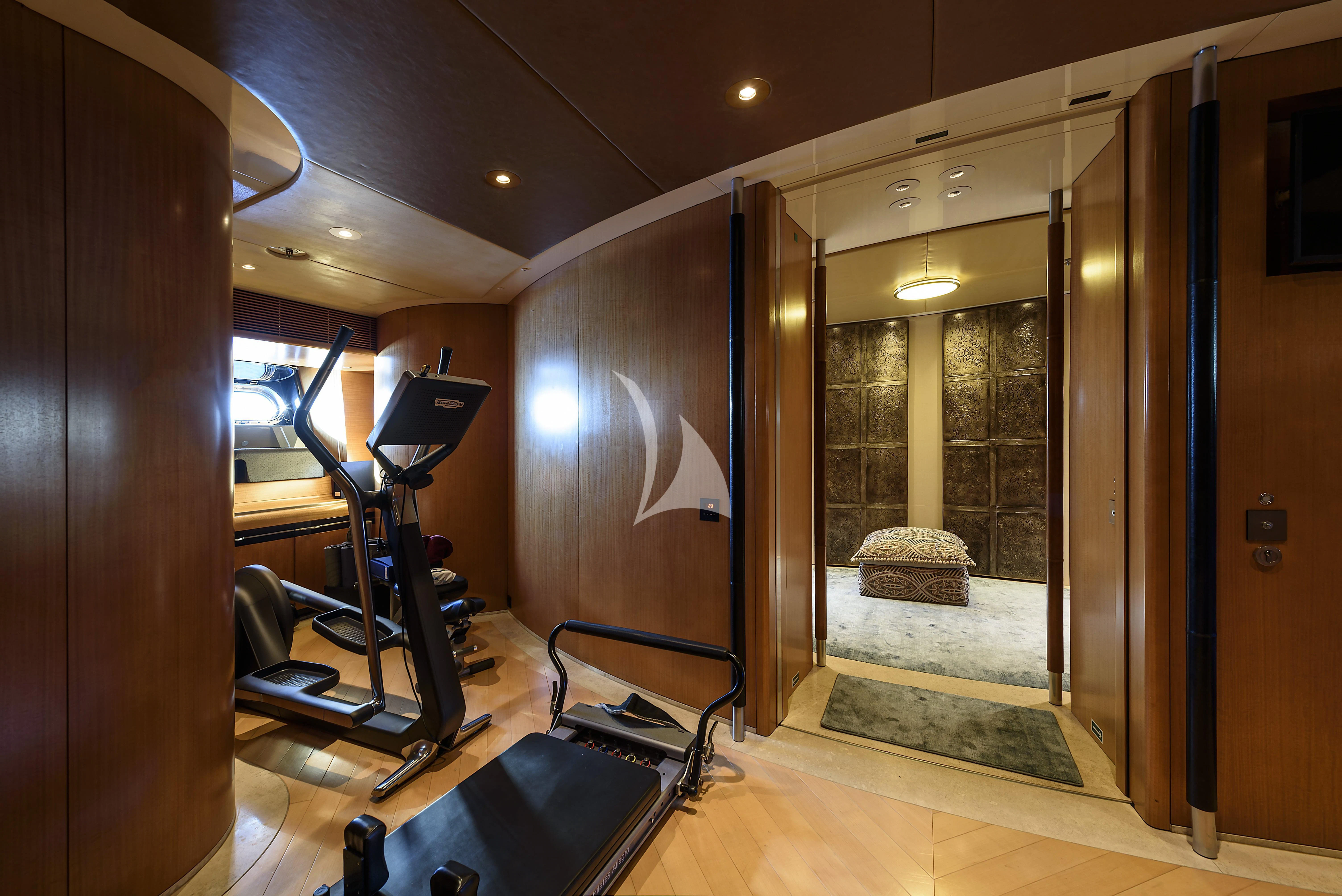 a room with a large glass door aboard MALTESE FALCON Yacht for Sale