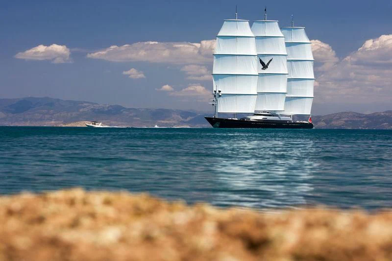 a boat in the water aboard MALTESE FALCON Yacht for Sale
