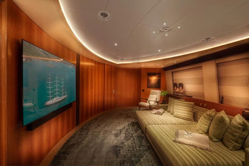 a room with a large screen aboard MALTESE FALCON Yacht for Sale