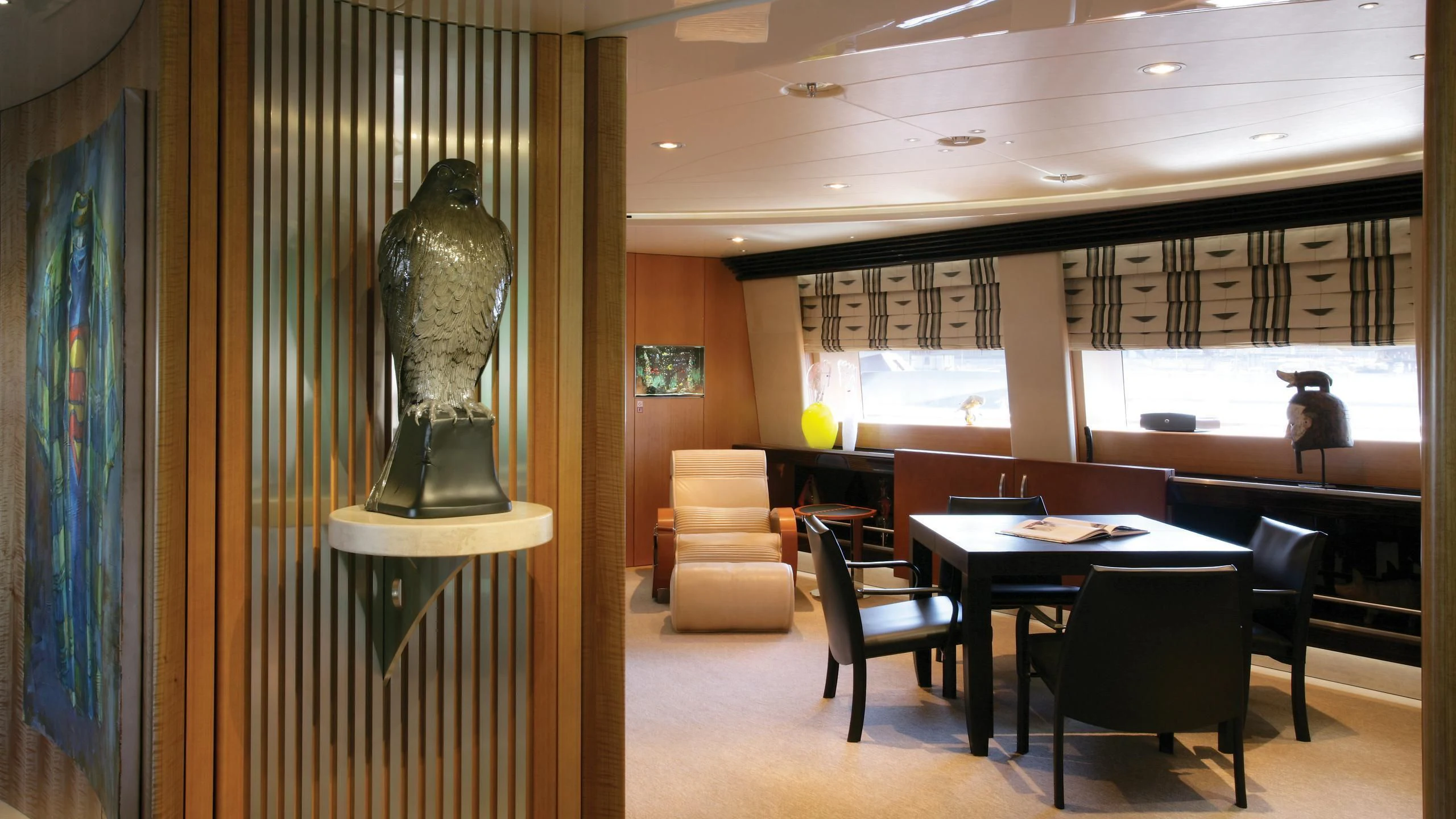 a large room with a statue aboard MALTESE FALCON Yacht for Sale