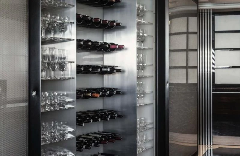 a group of wine glasses on a shelf aboard MALTESE FALCON Yacht for Sale