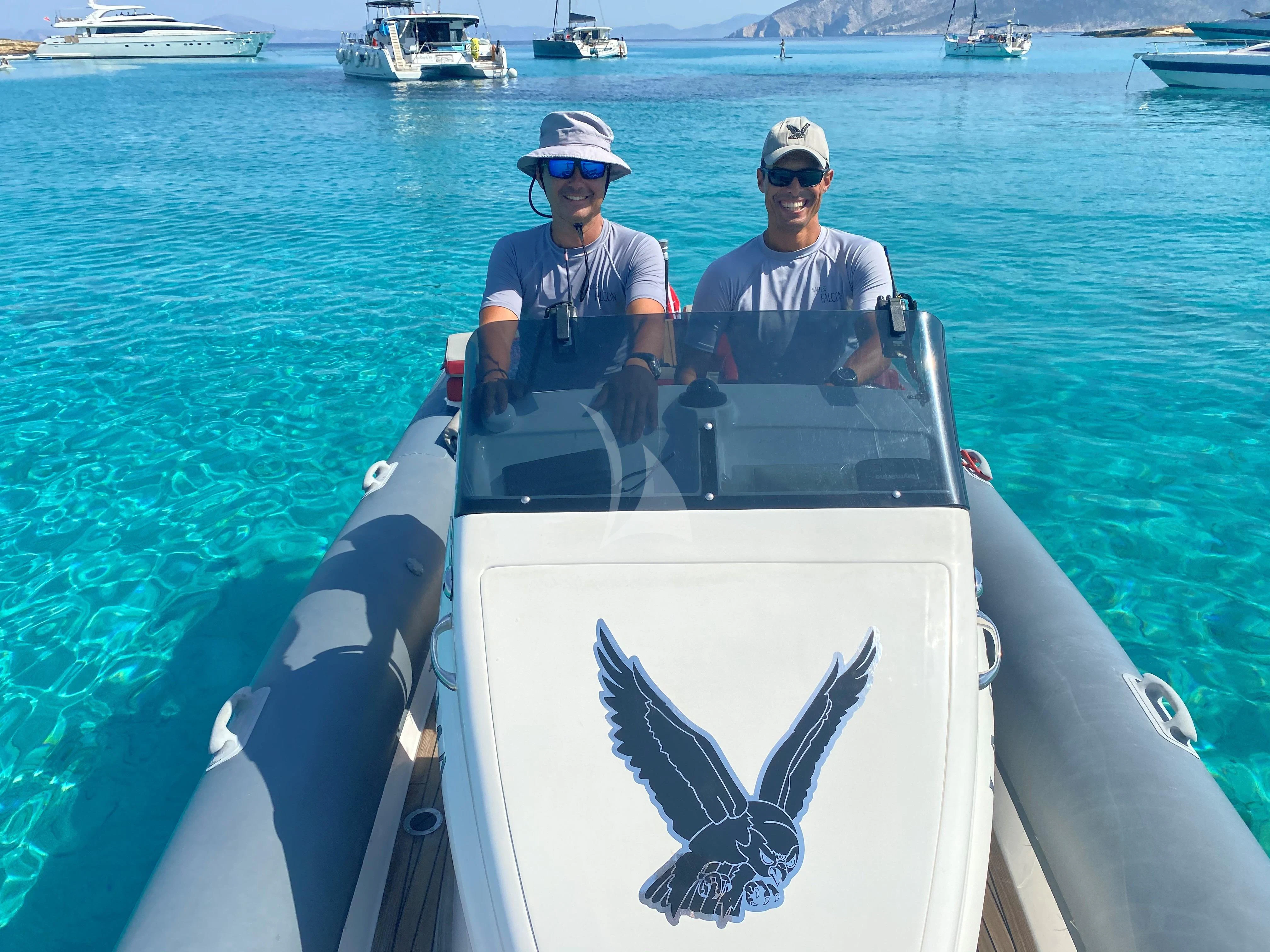 a group of men in a boat aboard MALTESE FALCON Yacht for Sale