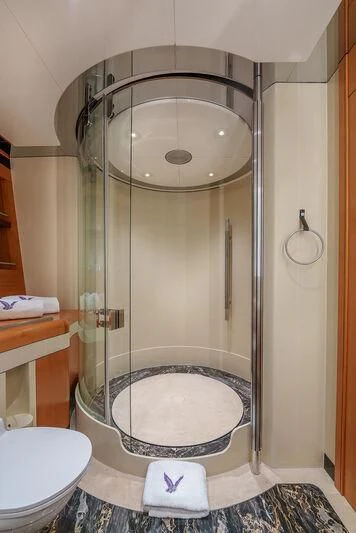 a shower with a round mirror aboard MALTESE FALCON Yacht for Sale