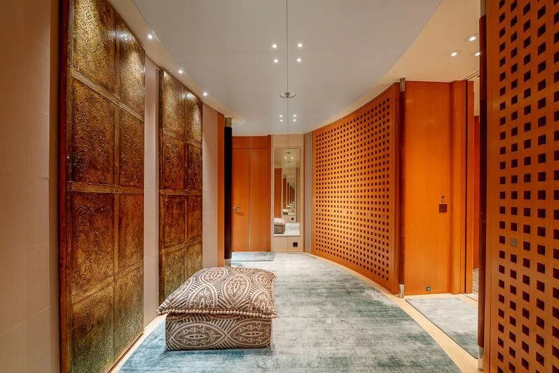 a room with a rug and a rug on the floor aboard MALTESE FALCON Yacht for Sale