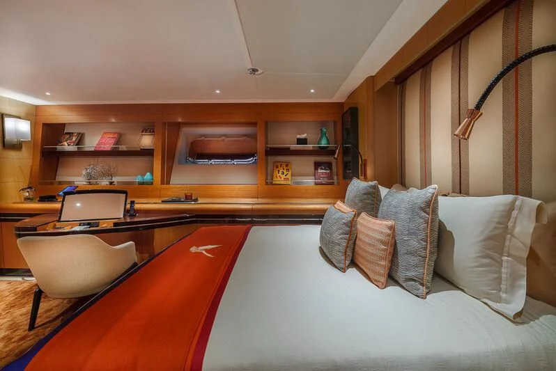 a room with a couch and a table aboard MALTESE FALCON Yacht for Sale