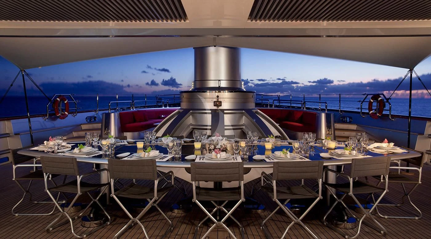 a large boat on a body of water aboard MALTESE FALCON Yacht for Sale