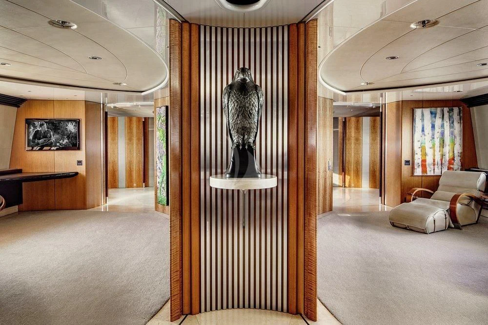 a large room with a statue aboard MALTESE FALCON Yacht for Sale