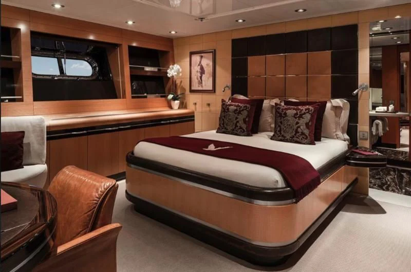 a bed in a room aboard MALTESE FALCON Yacht for Sale