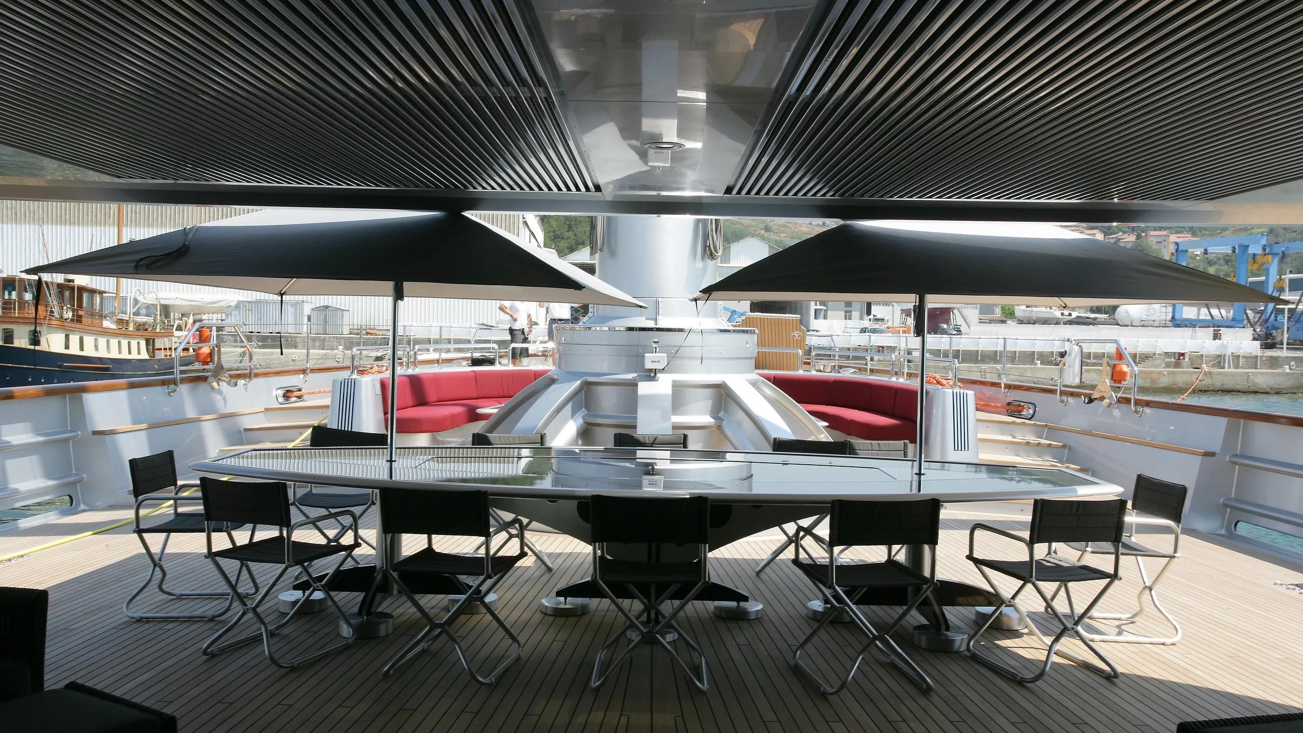 a large room with tables and chairs aboard MALTESE FALCON Yacht for Sale