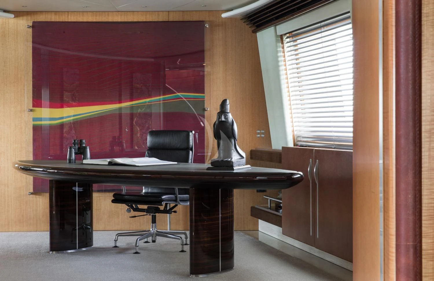a black statue on a desk aboard MALTESE FALCON Yacht for Sale