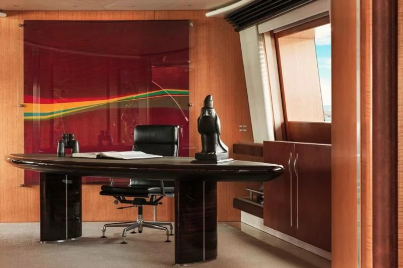 a black desk in a room aboard MALTESE FALCON Yacht for Sale