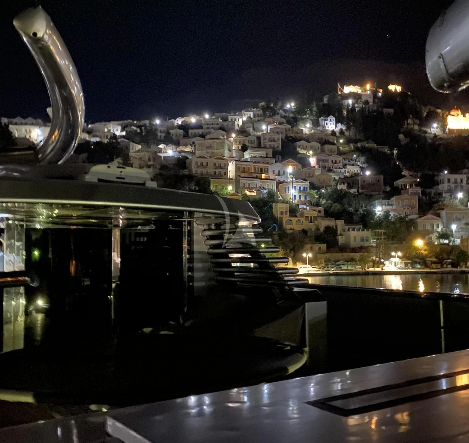 a view of a city at night aboard MALTESE FALCON Yacht for Sale