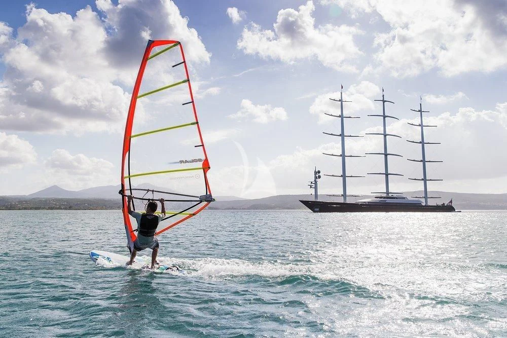 a person surfing in the sea aboard MALTESE FALCON Yacht for Sale