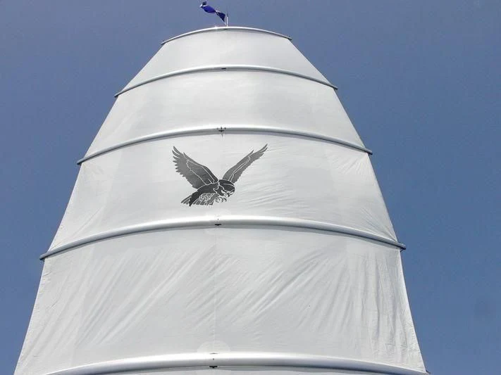 a bird flying over a tall tower aboard MALTESE FALCON Yacht for Sale
