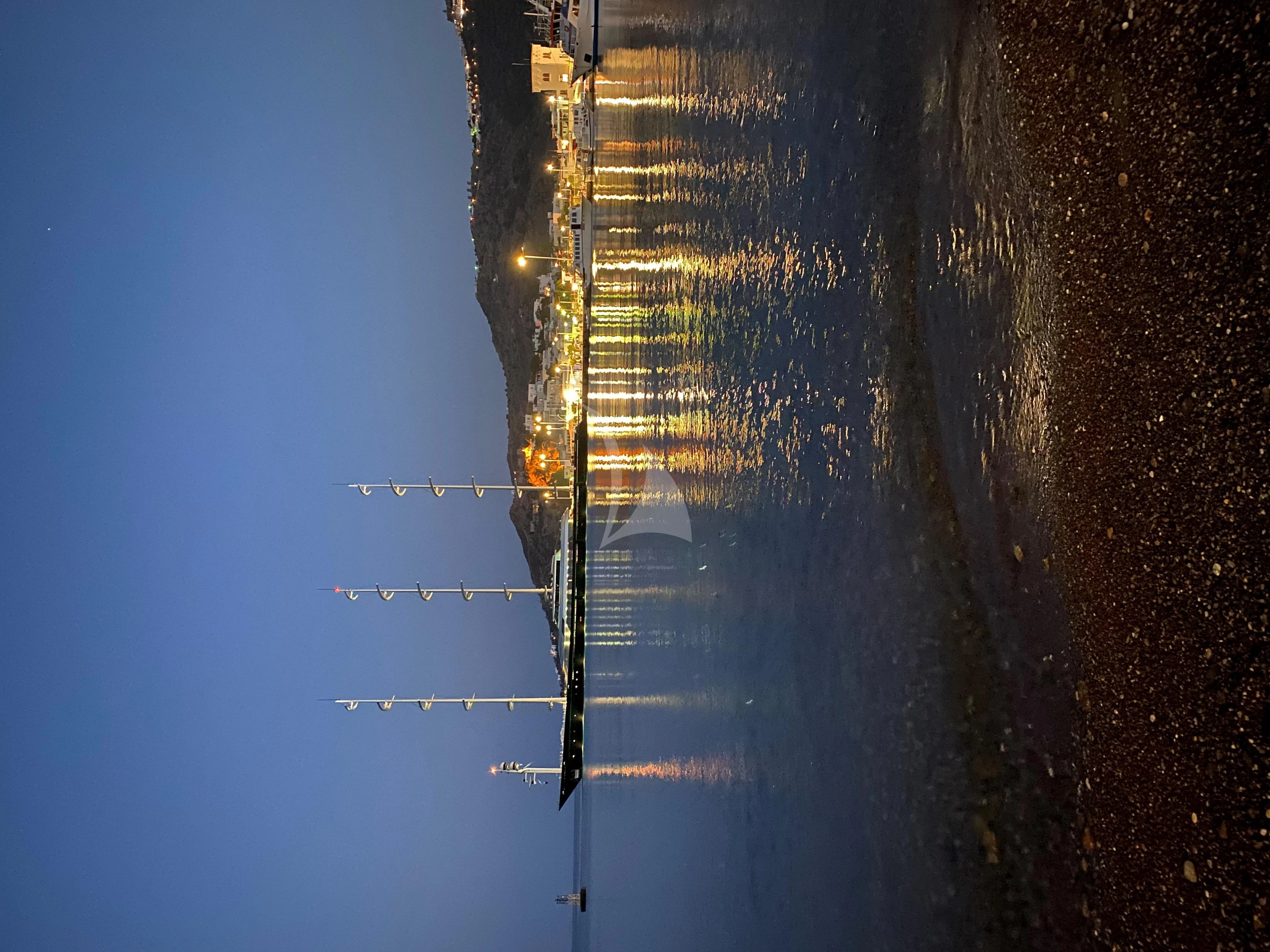 a view of a city through a window aboard MALTESE FALCON Yacht for Sale