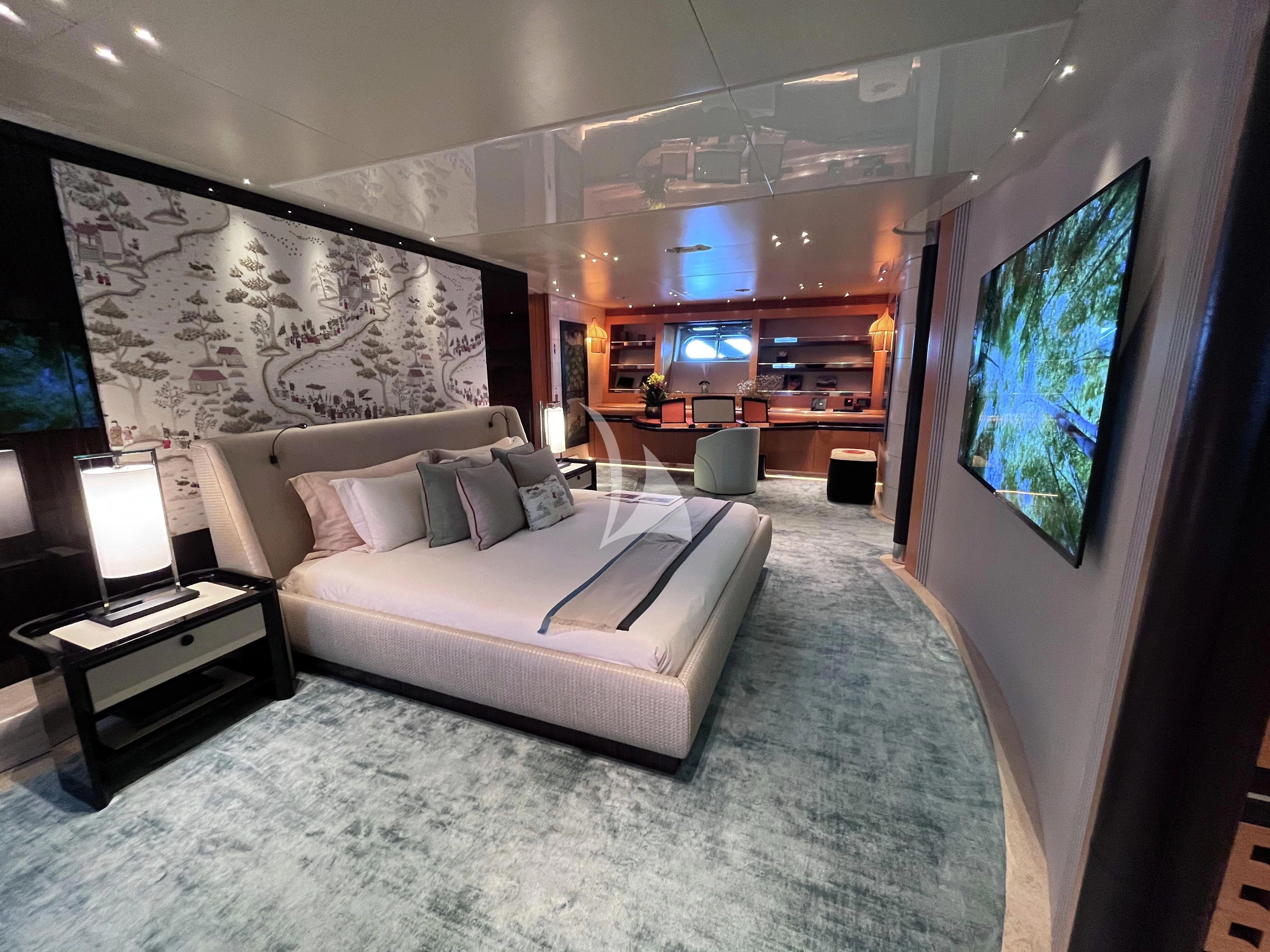 a bedroom with a large bed aboard MALTESE FALCON Yacht for Sale