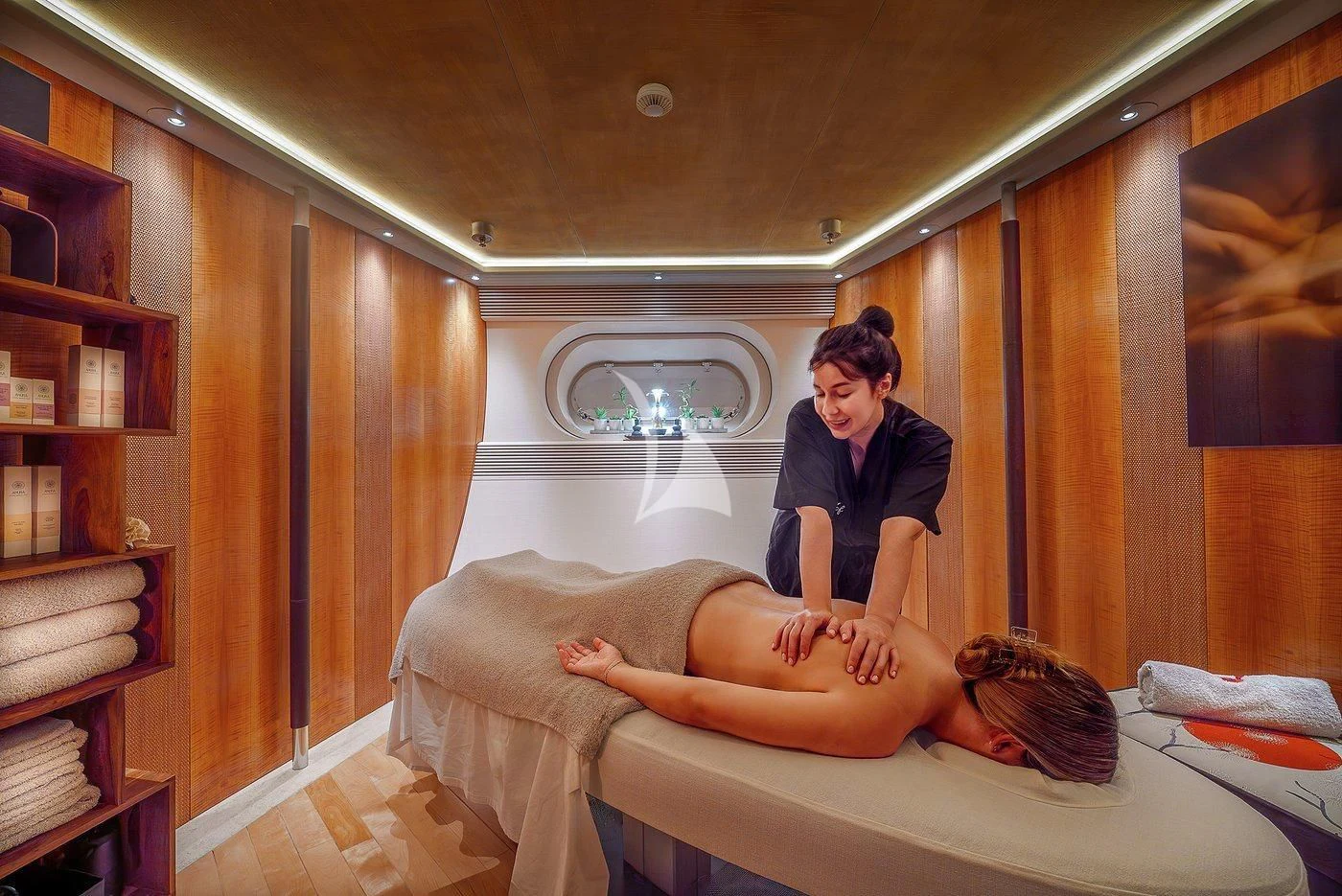 a man and a woman in a room aboard MALTESE FALCON Yacht for Sale