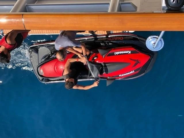 a group of people in a boat aboard MALTESE FALCON Yacht for Sale