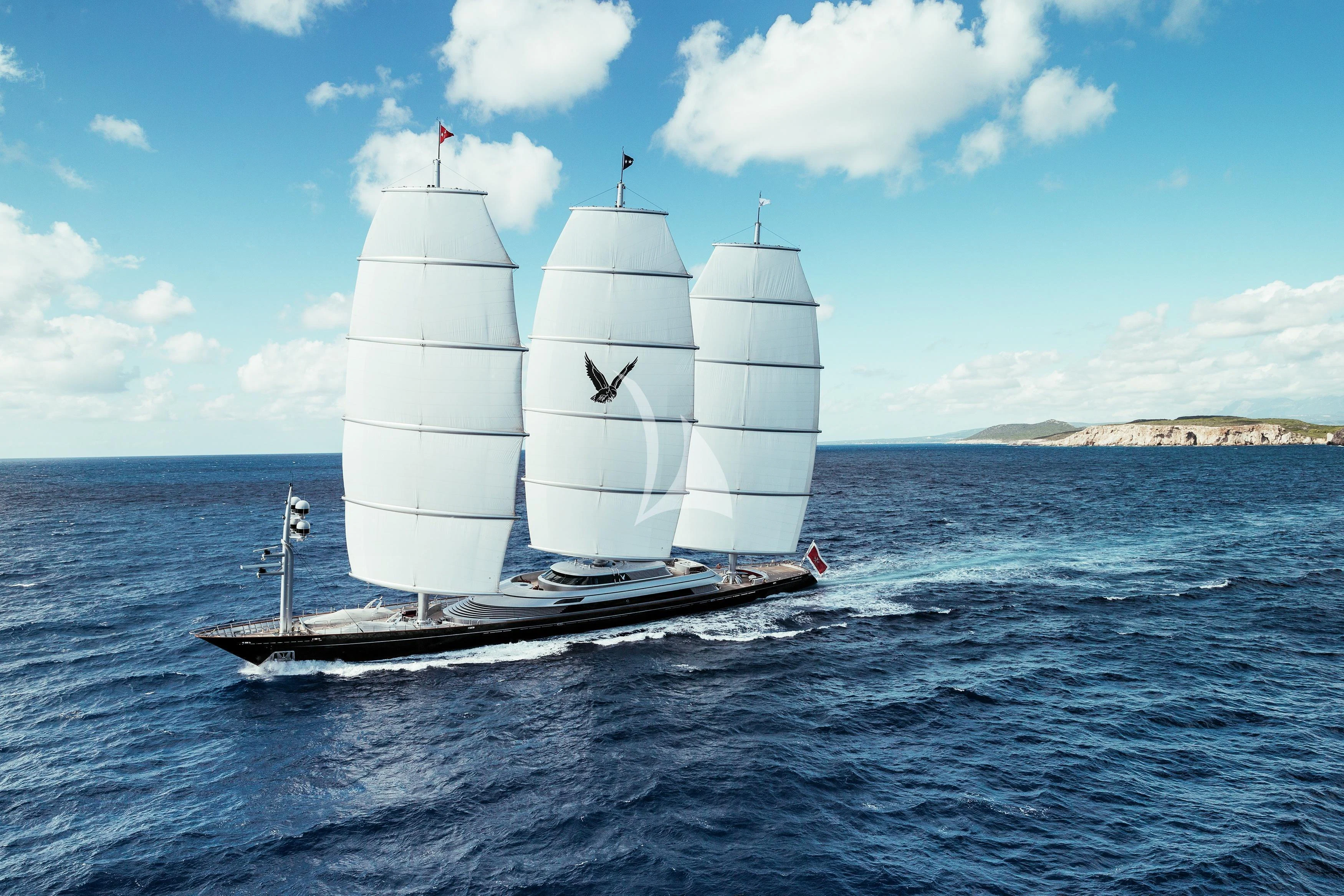 a couple of sailboats on the water aboard MALTESE FALCON Yacht for Sale