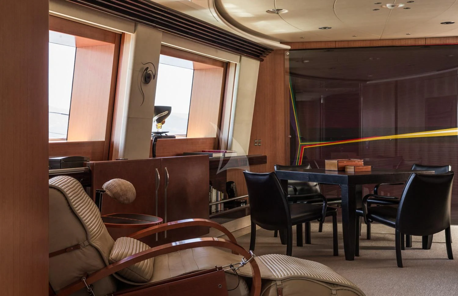 a room with a couch and chairs aboard MALTESE FALCON Yacht for Sale