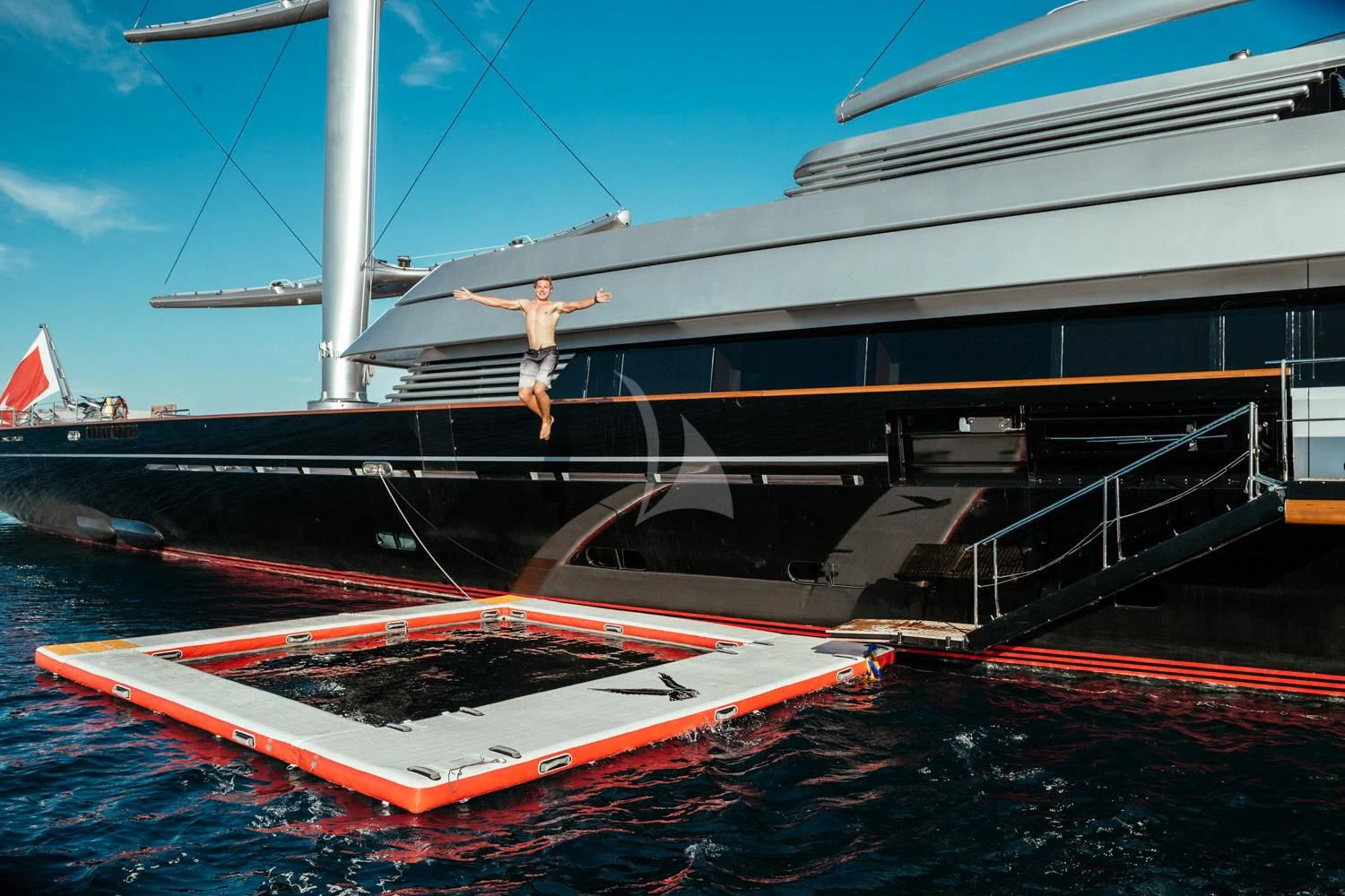a person standing on a boat aboard MALTESE FALCON Yacht for Sale