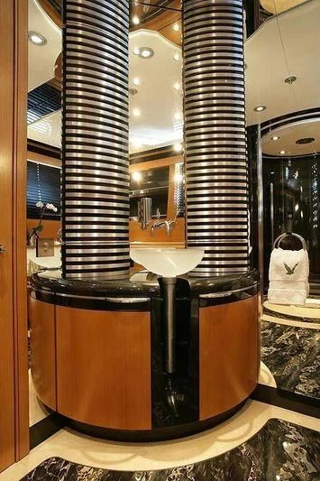 a glass of beer aboard MALTESE FALCON Yacht for Sale