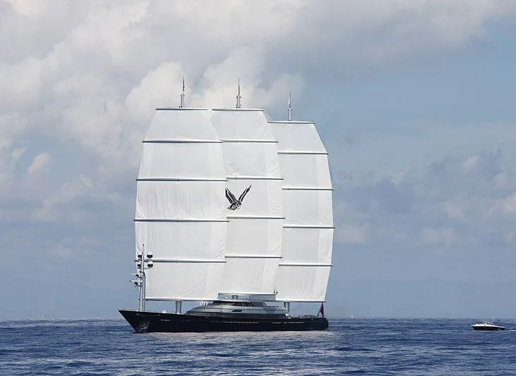 a white boat on the water aboard MALTESE FALCON Yacht for Sale
