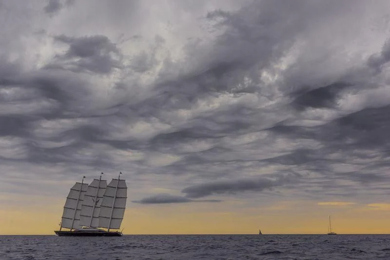 a large ship in the water aboard MALTESE FALCON Yacht for Sale